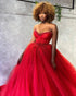 Red Voluminous Ball Gown