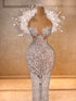 Feathered Elegance Couture Gown