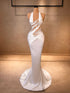 Ivory Elegance Strappy Ruffle Gown